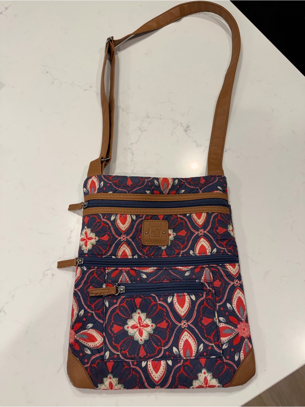 Stone Mountain Accessories Navy and Tan Floral Crossbody